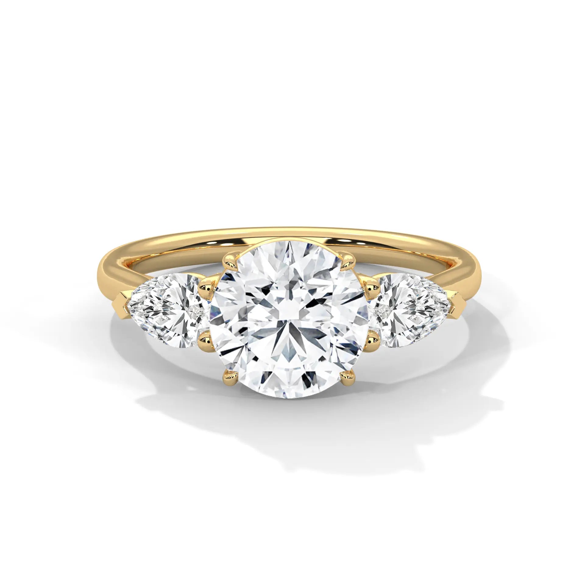 MJBS4 - Round Brilliant Three Stone Pear Accent Ring