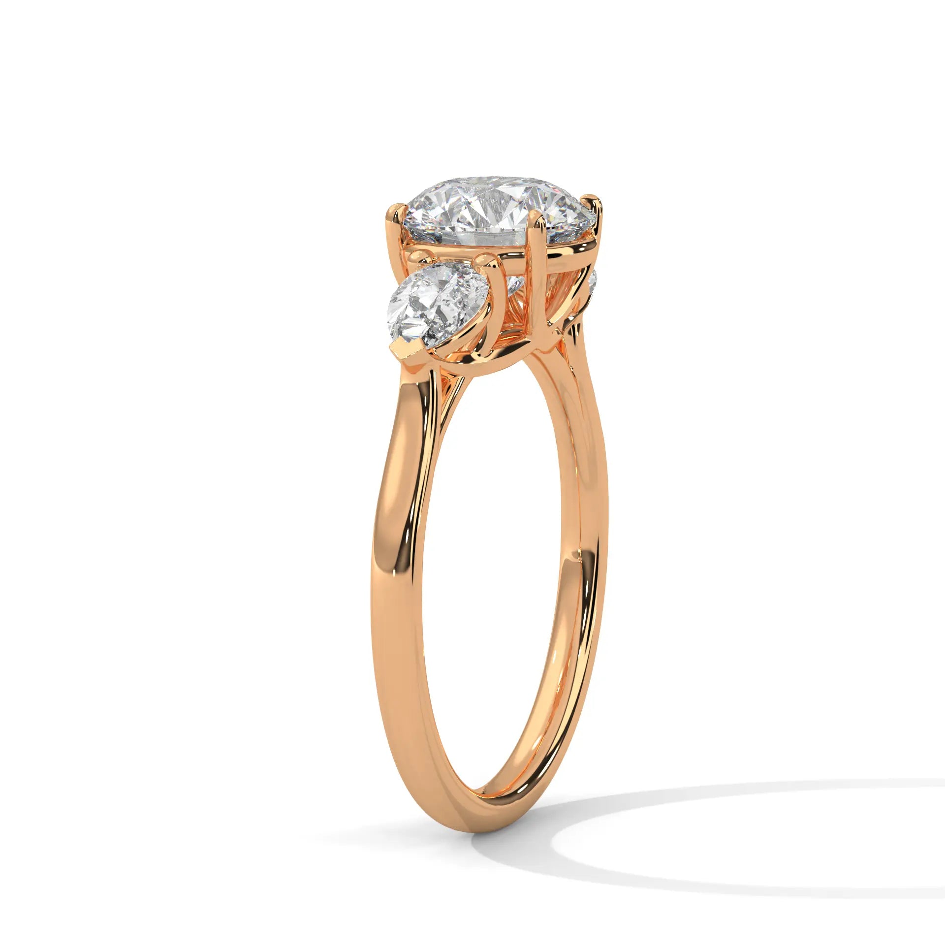MJBS4 - Round Brilliant Three Stone Pear Accent Ring