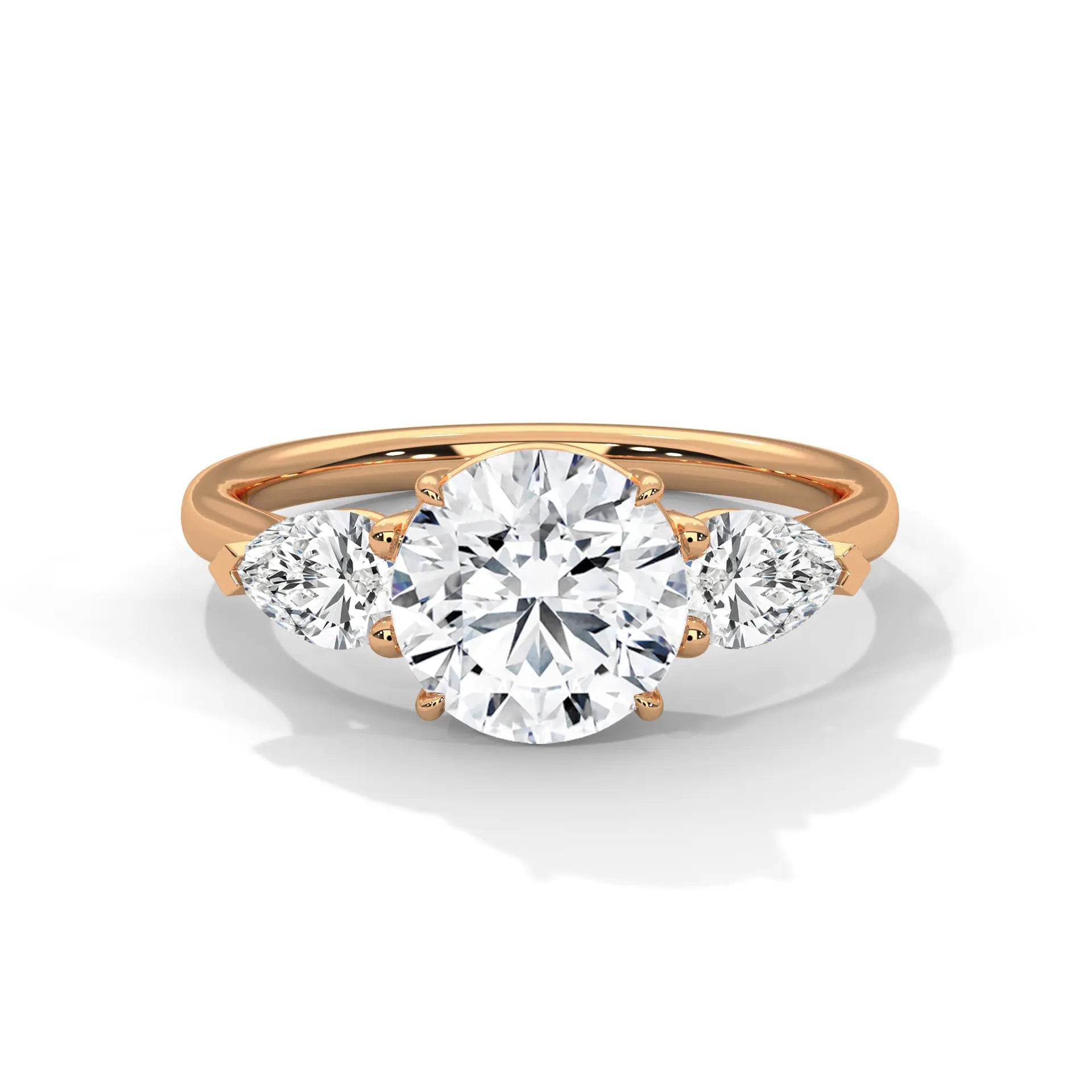 MJBS4 - Round Brilliant Three Stone Pear Accent Ring