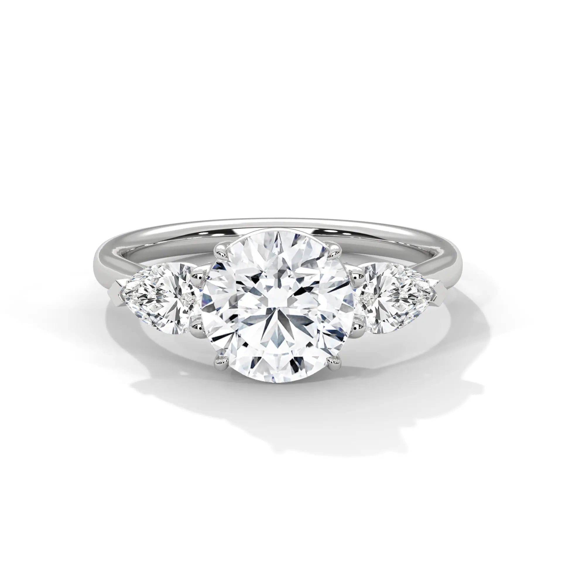 MJBS4 - Round Brilliant Three Stone Pear Accent Ring