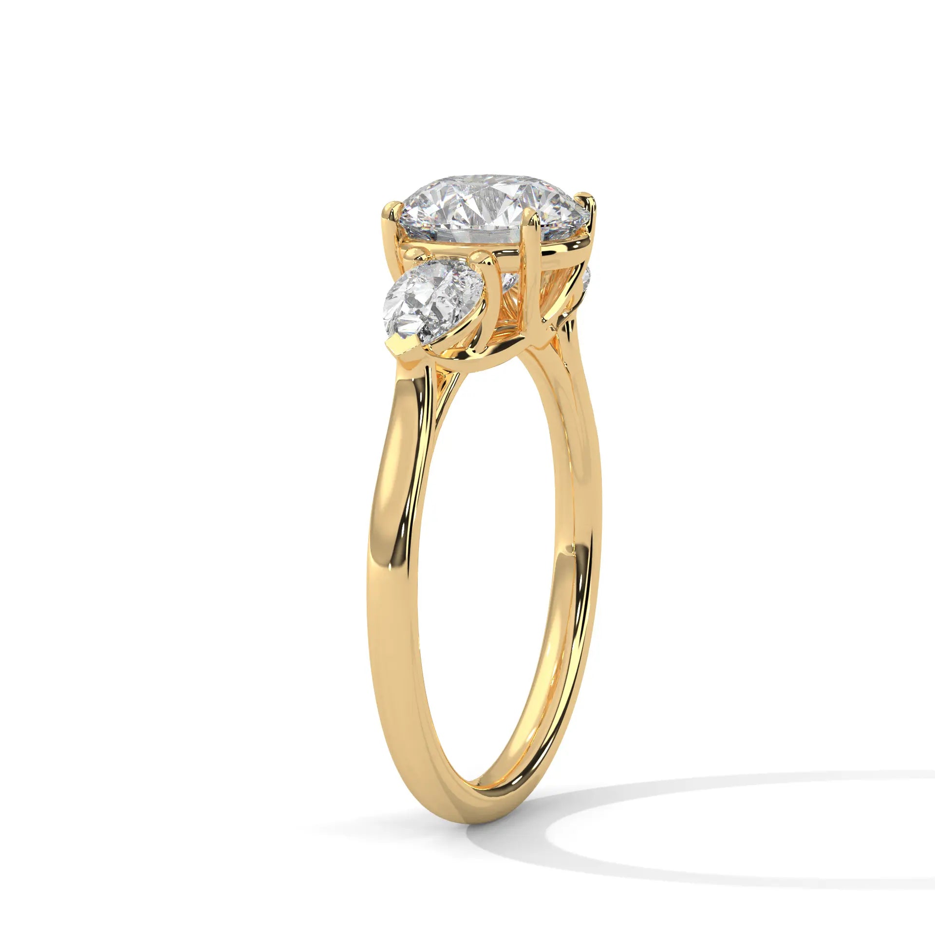 MJBS4 - Round Brilliant Three Stone Pear Accent Ring