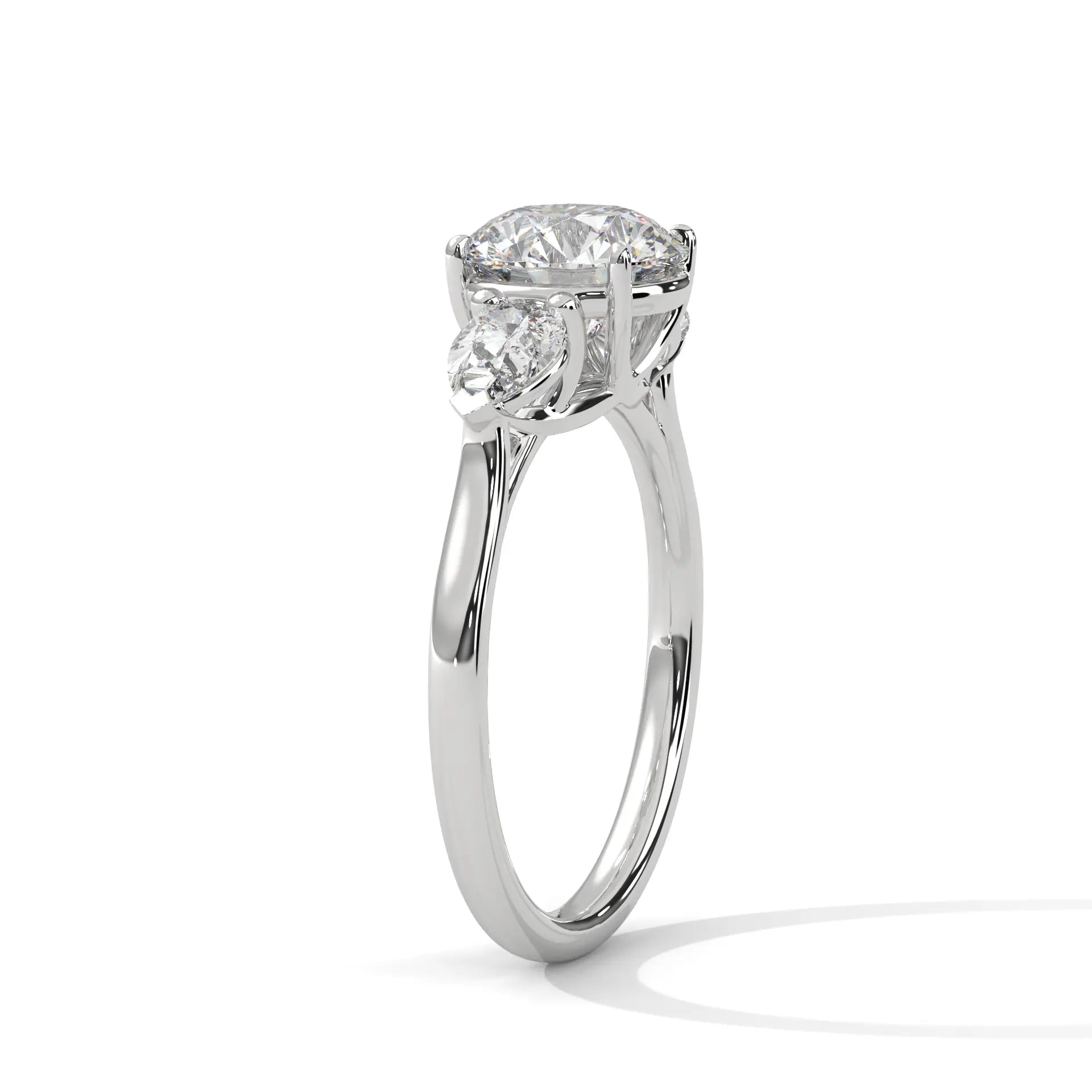 MJBS4 - Round Brilliant Three Stone Pear Accent Ring