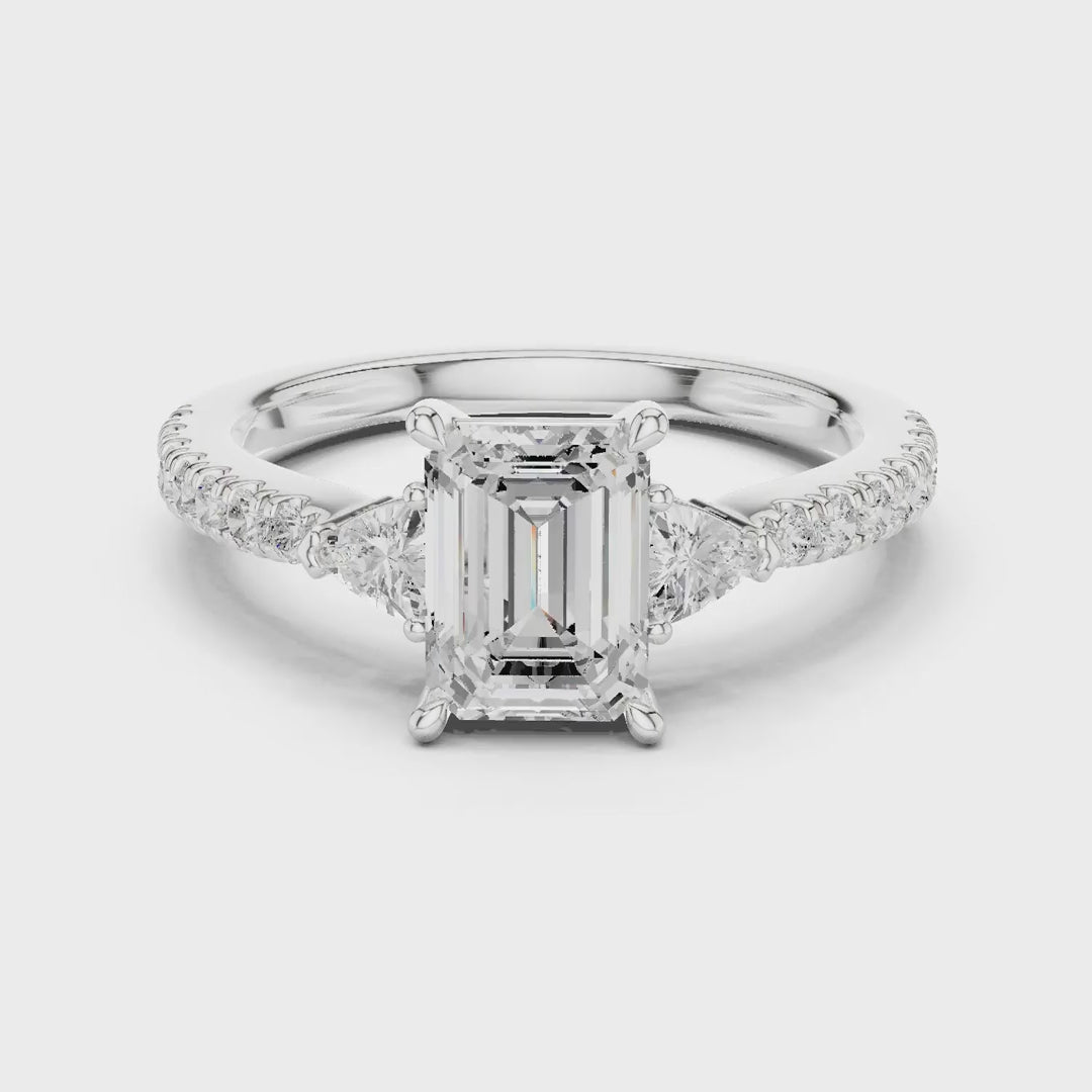MJR0146- Elegant Emerald Cut Side-Flanked Brilliant Band