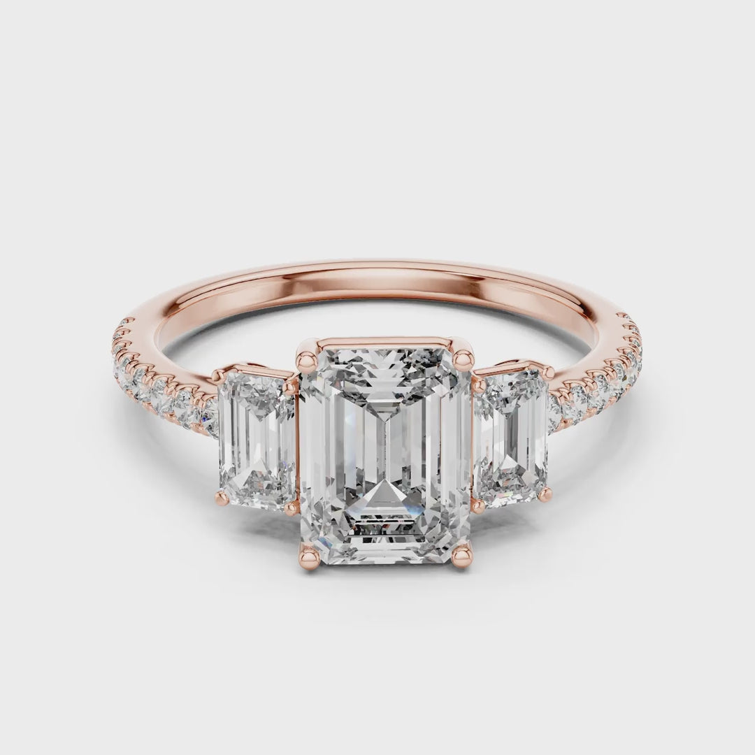 MJR053 - Emerald Cut High Sparkle French Set Three Stone Ring