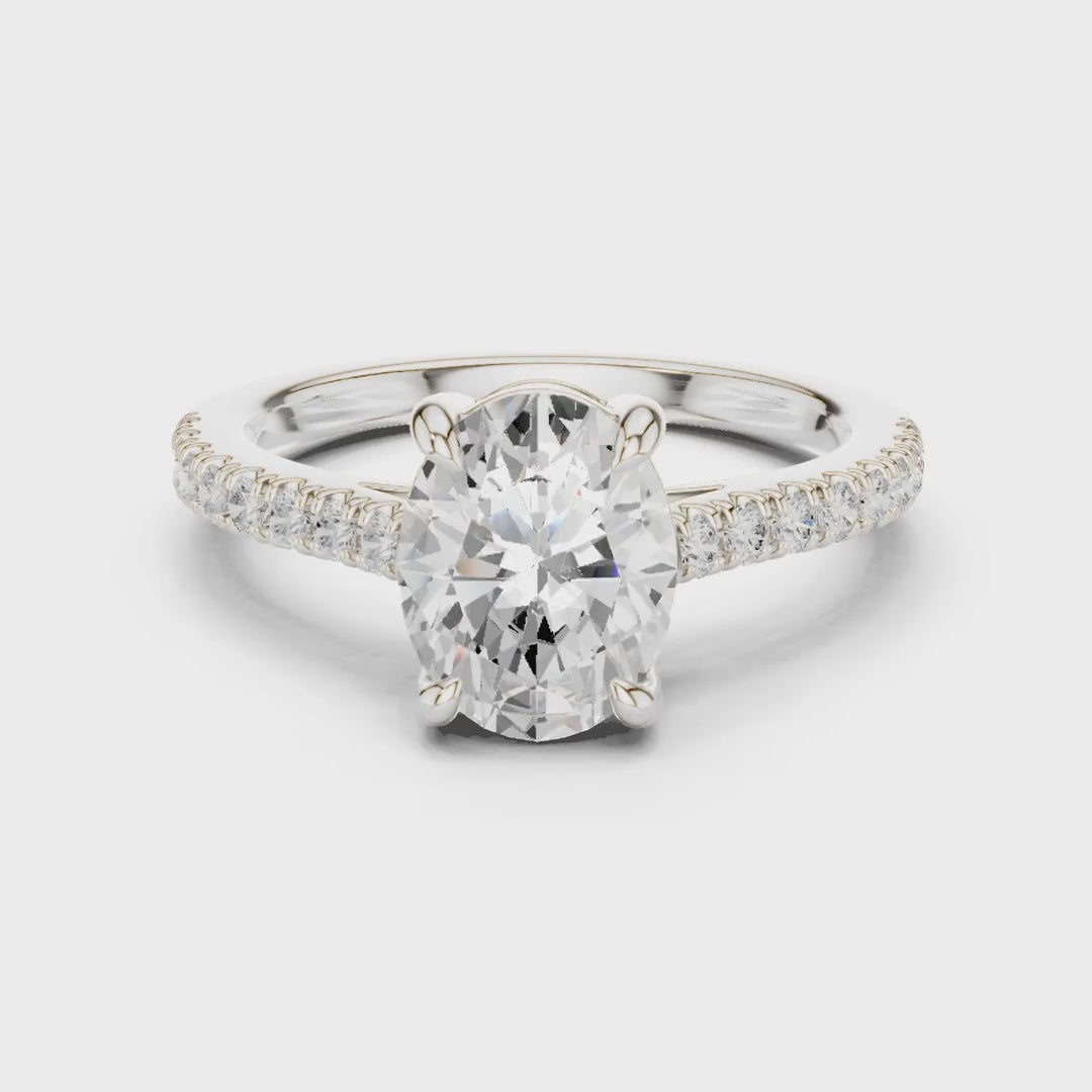 MJR089 - Oval Cut Solitaire Engagement Ring with Pavé Band