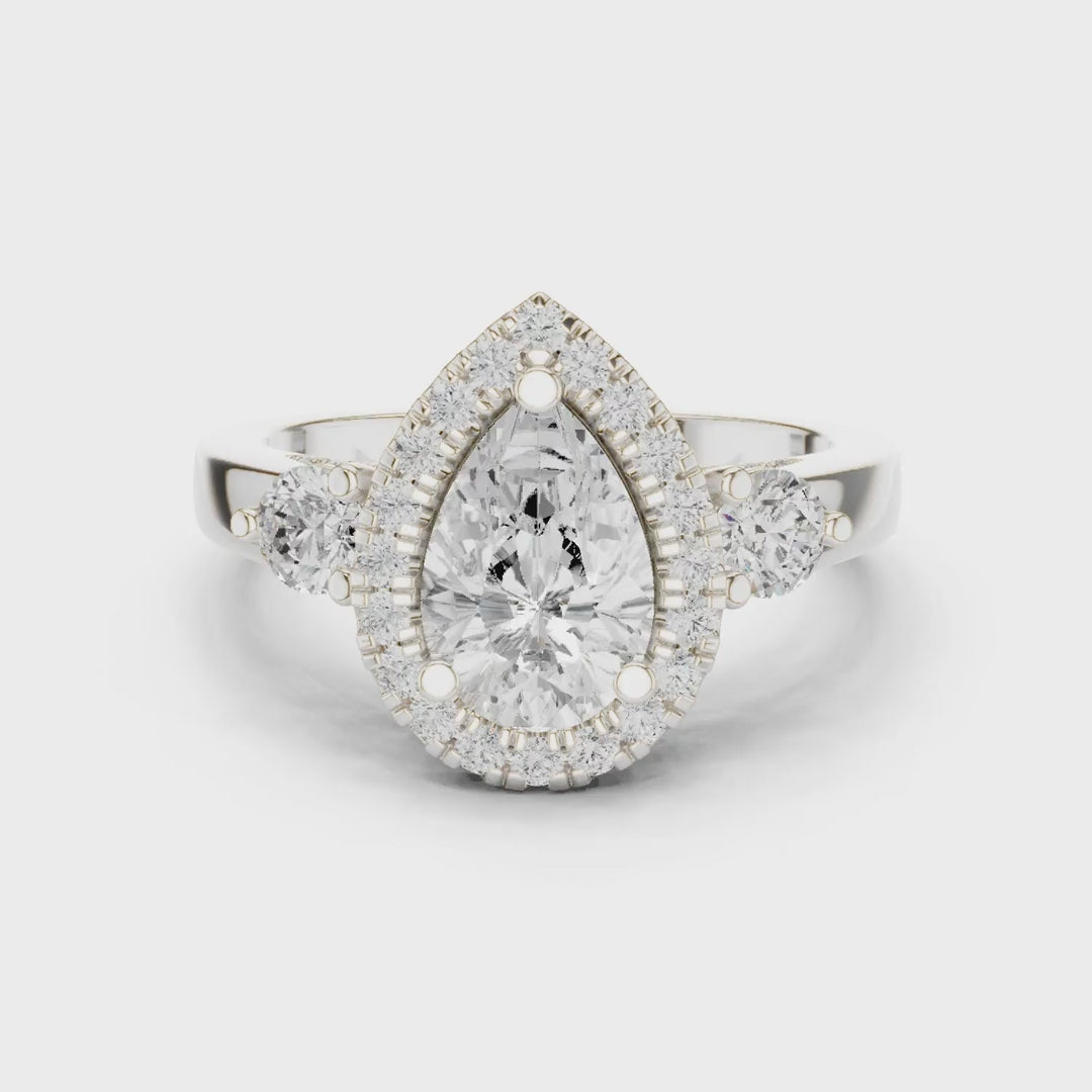 MJR0127 - Pear Cut Halo Ring with Round Side Gem Accents