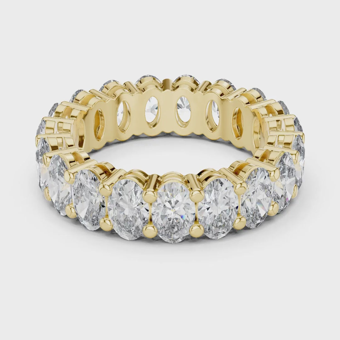 MJET020 - Oval Cut Shared Prong Full Eternity Statement Band