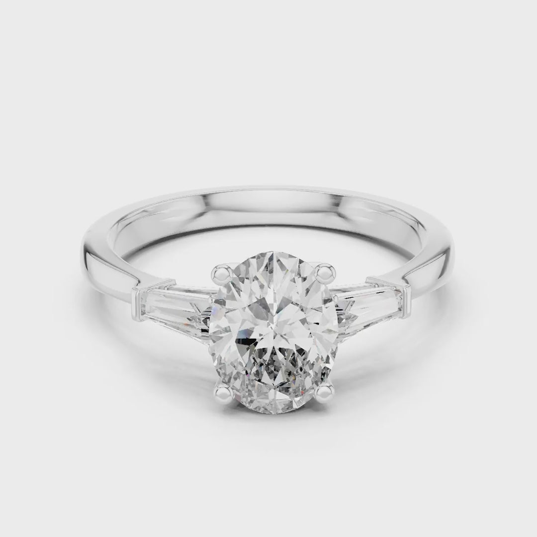 MJR082 - Oval Center Three Stone Ring with Tapered Baguettes