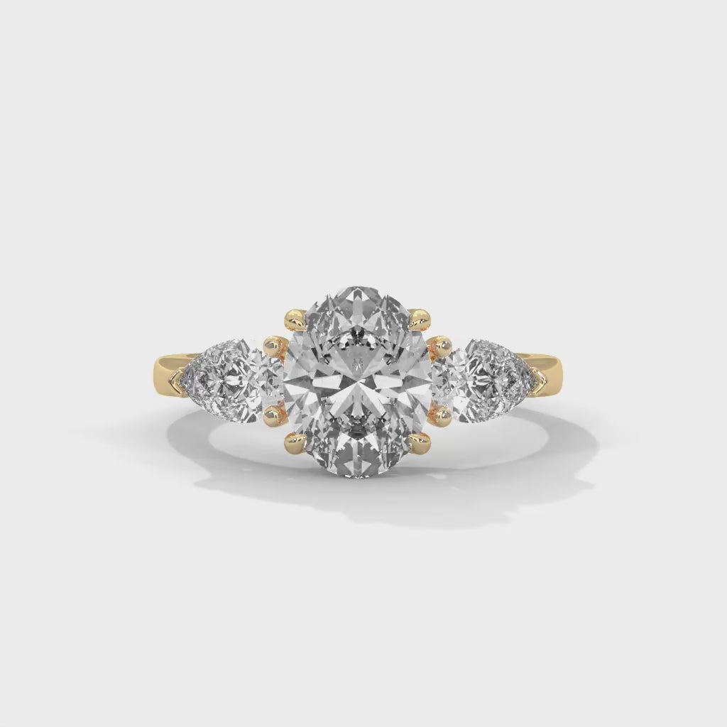 MJBS45 - Oval Cut Solitaire with Pear Shape Side Stones
