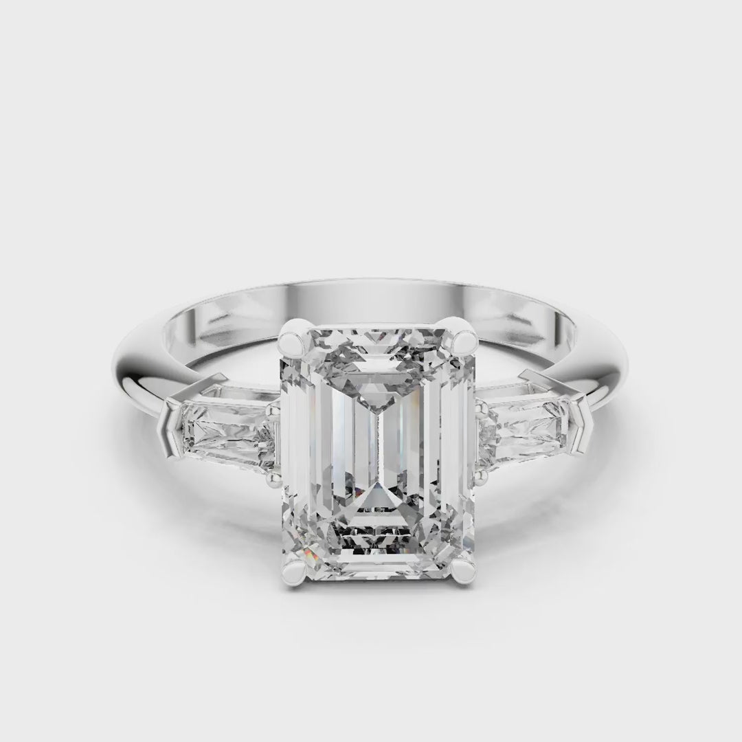 MJR0125 - Classic Emerald Center Stone Flanked by Tapered Baguettes