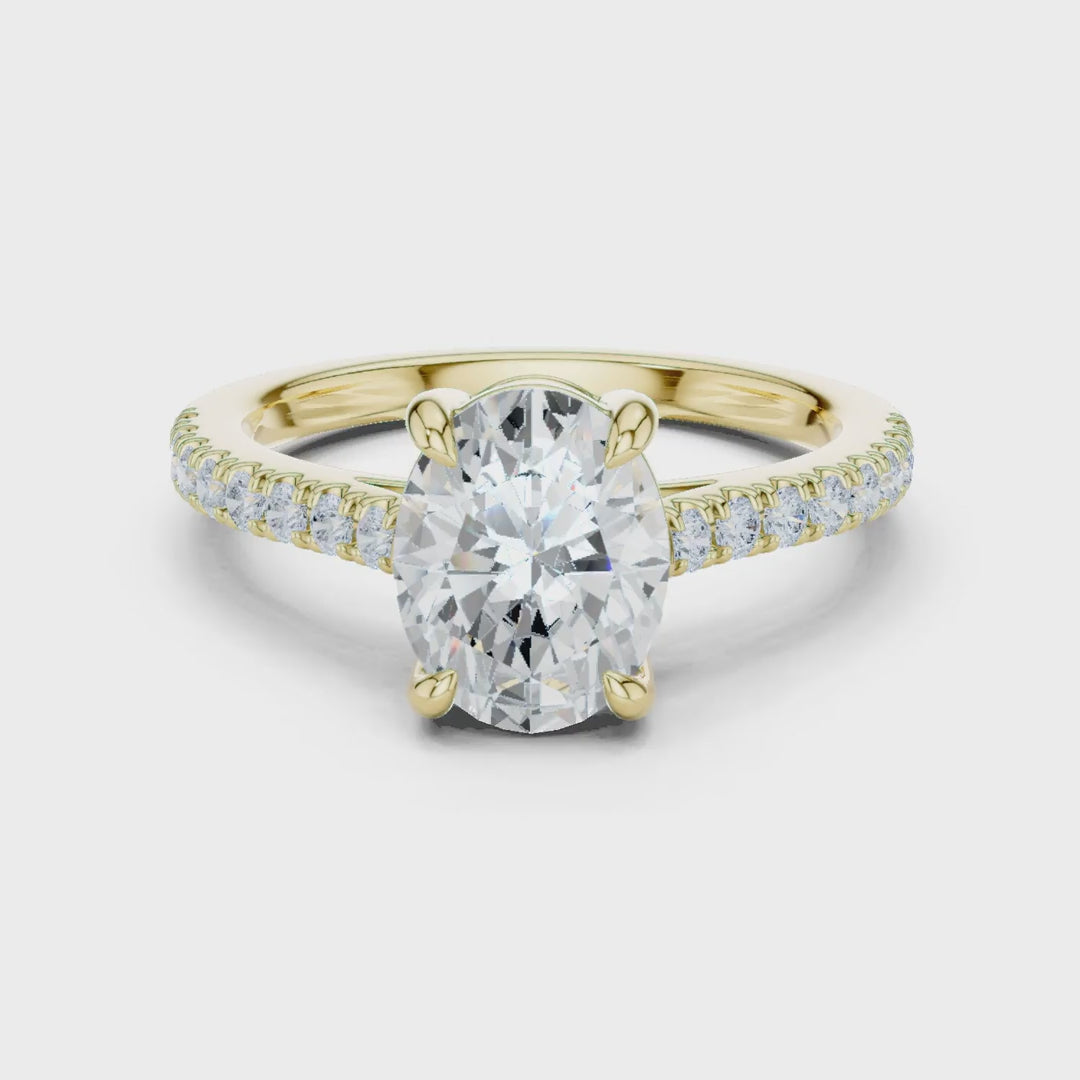 MJR089 - Oval Cut Solitaire Engagement Ring with Pavé Band