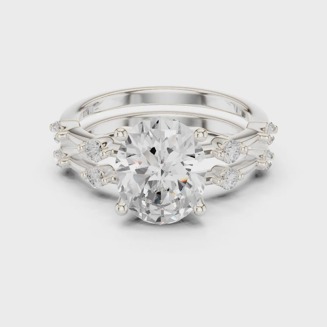 MJTW15 - Oval Cut Solitaire Ring with Stationed Accent Band