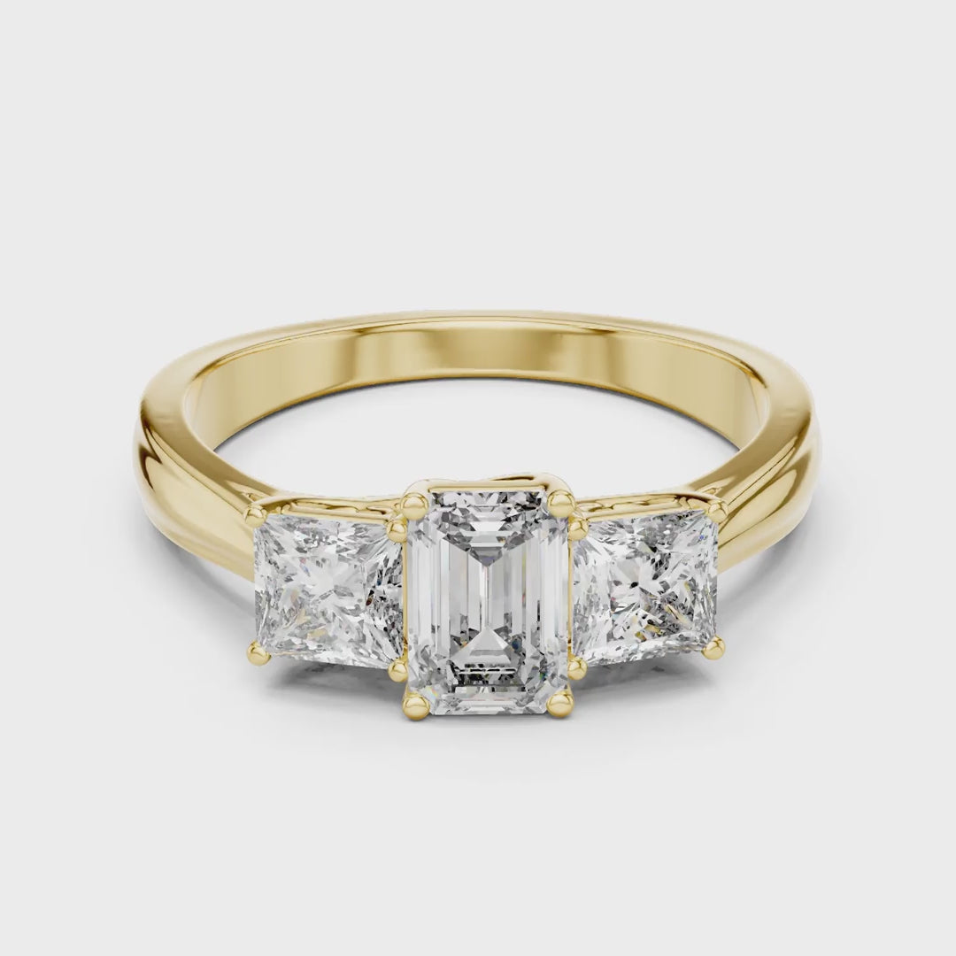 MJR007 - Emerald Cut Three Stone Engagement Ring