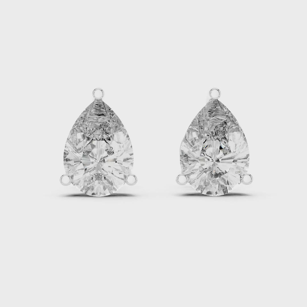 MJER02 - Classic Four-Prong Round Cut Solitaire Studs