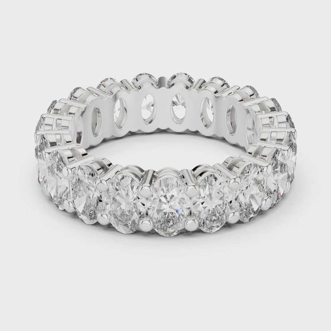 MJET020 - Oval Cut Shared Prong Full Eternity Statement Band