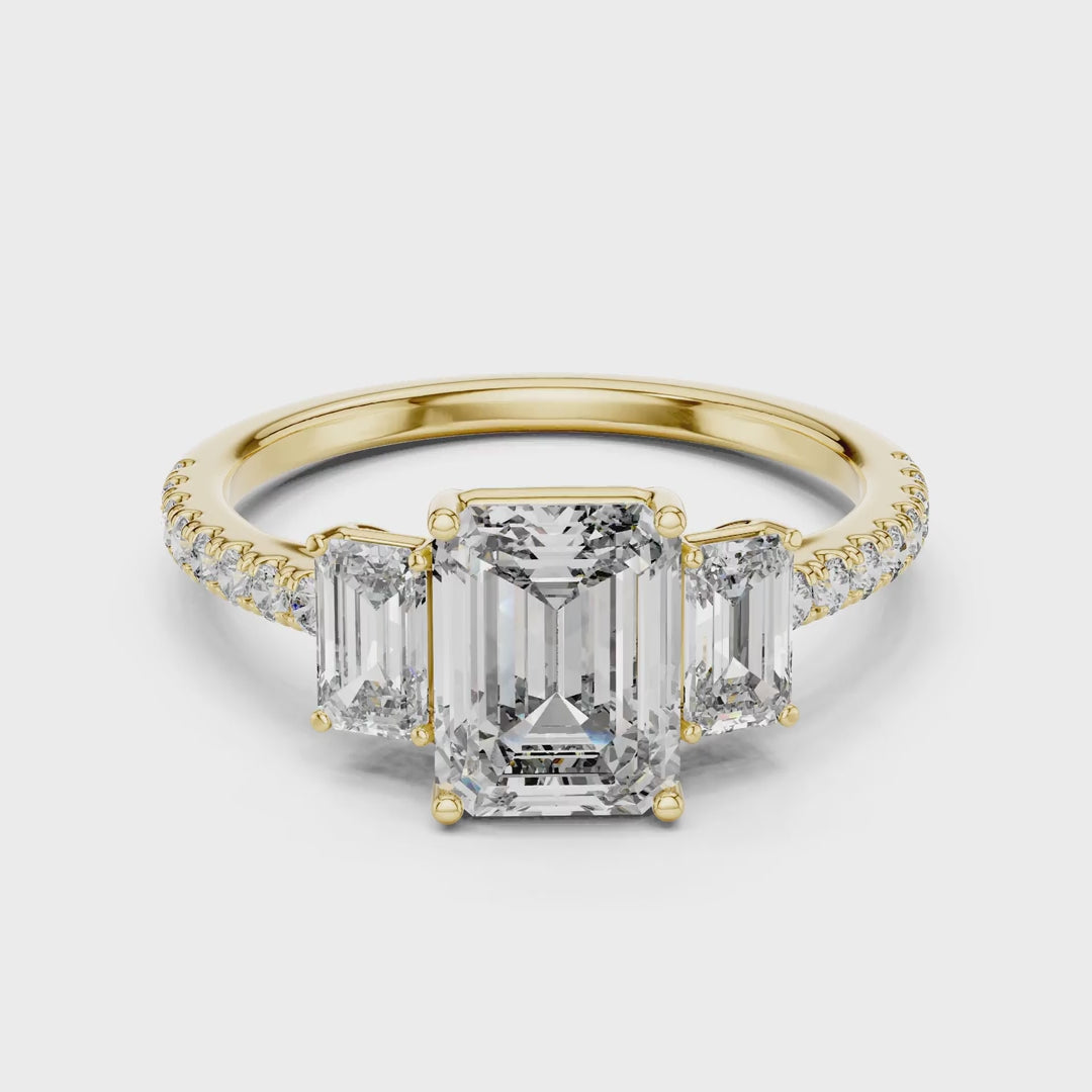 MJR053 - Emerald Cut High Sparkle French Set Three Stone Ring
