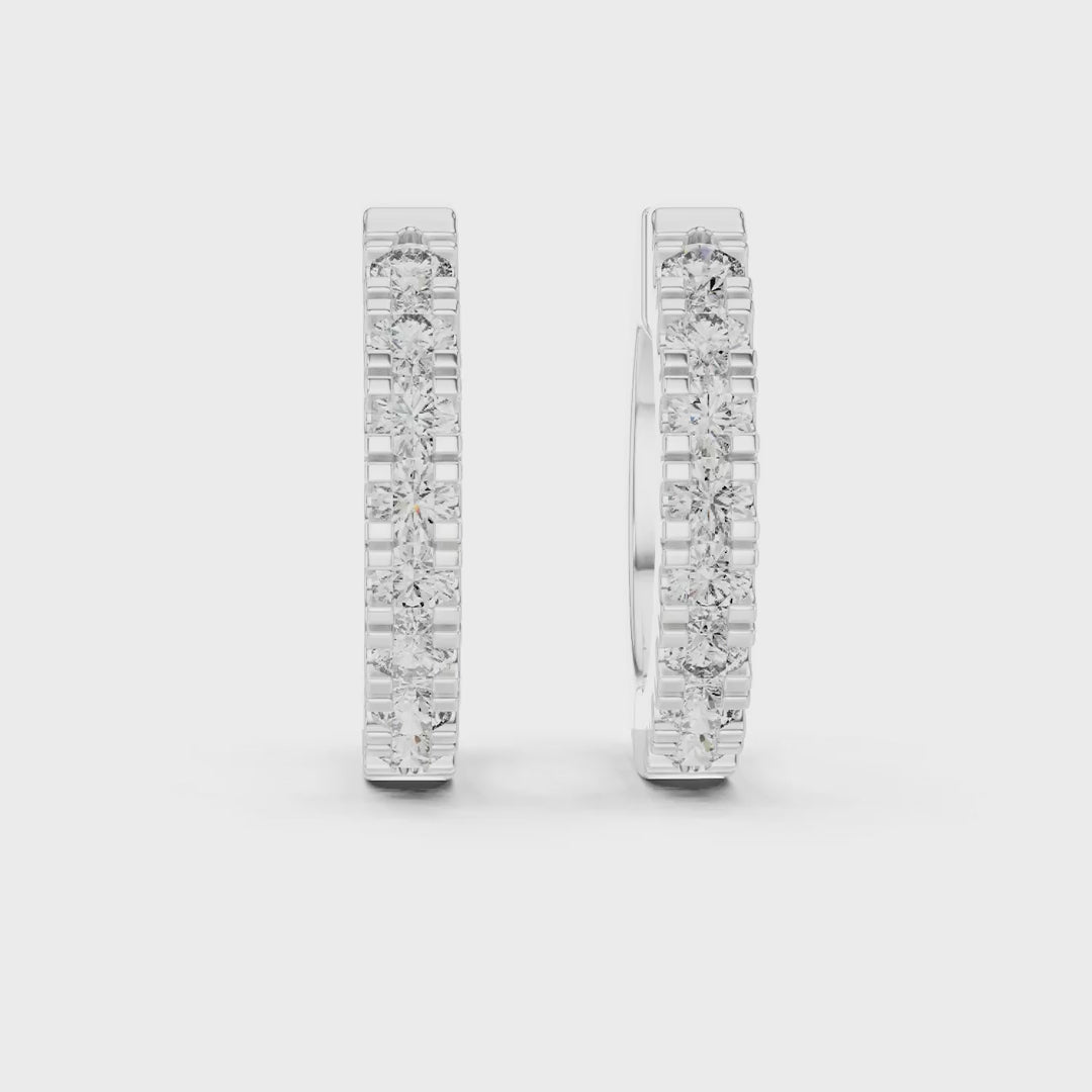 MJER23 - Channel Set Round Stone Huggies