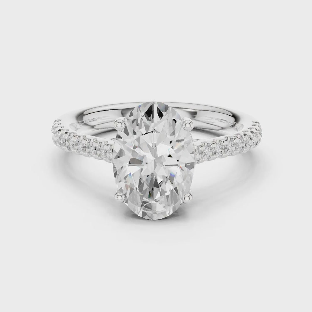 MJR077 - Oval Cut Hidden Halo Encrusted Collar Ring