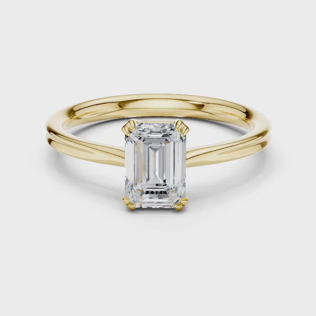 MJR0155 - Double Claw Emerald Solitaire Ring on Rounded Shank