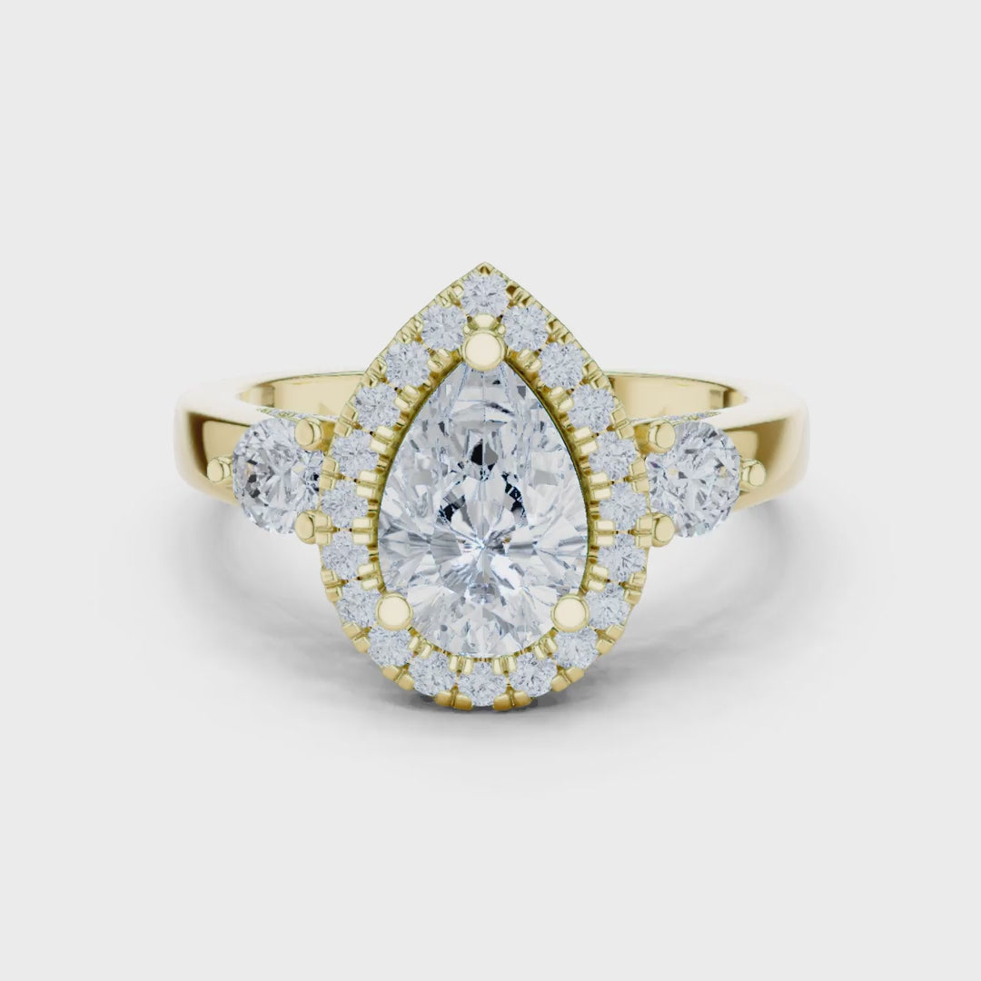 MJR0127 - Pear Cut Halo Ring with Round Side Gem Accents