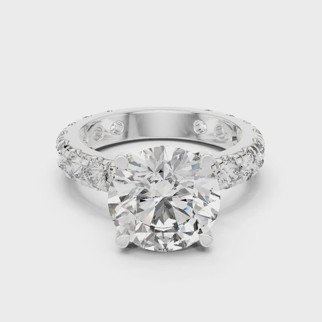 MJR0121 - Round Brilliant Solitaire Ring with Shared-Prong Eternity Band
