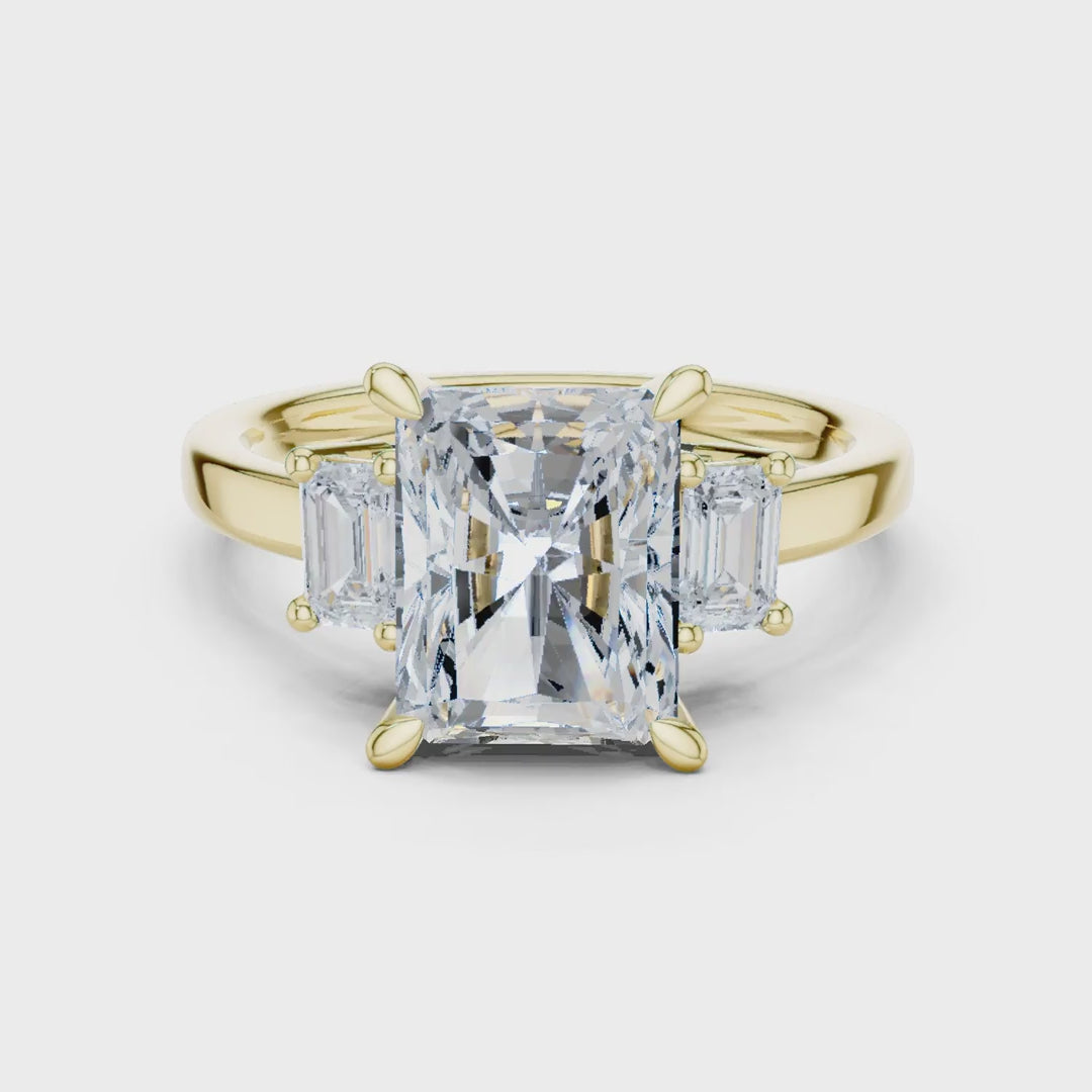 MJR0149 - Radiant Center Three Stone Ring with Side Trapezoids