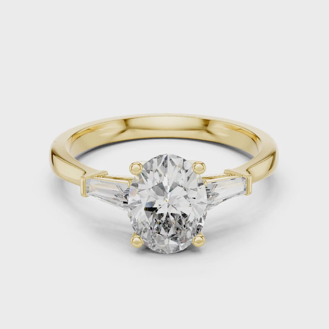 MJR082 - Oval Center Three Stone Ring with Tapered Baguettes