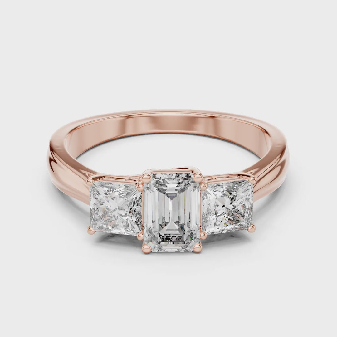 MJR007 - Emerald Cut Three Stone Engagement Ring