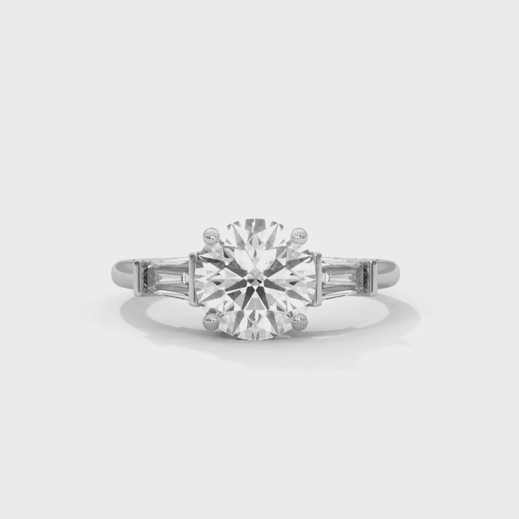 MJBS30 - Round Cut Solitaire with Tapered Baguette Side Stones