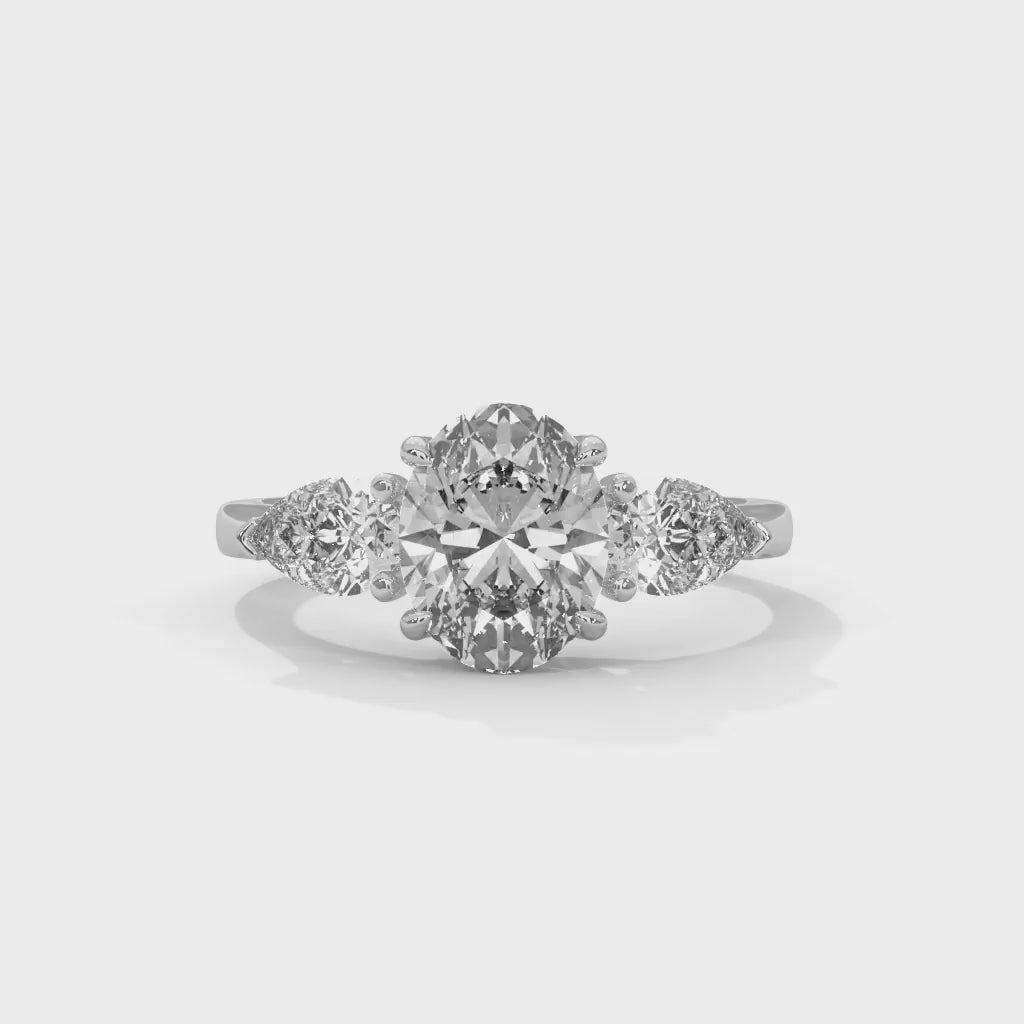 MJBS45 - Oval Cut Solitaire with Pear Shape Side Stones