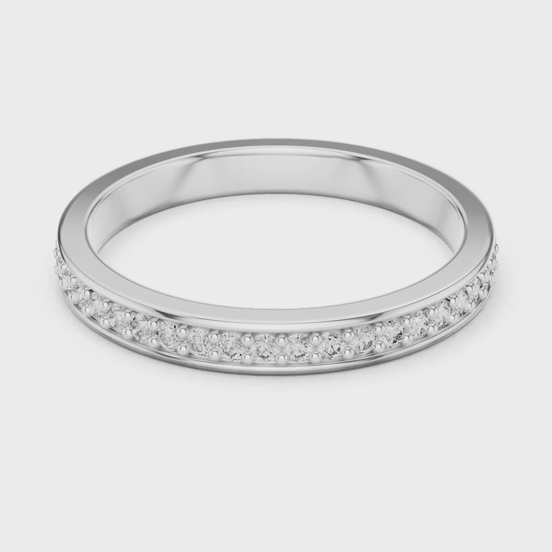 MJET008 - Round Brilliant Channel Set Half Eternity Band