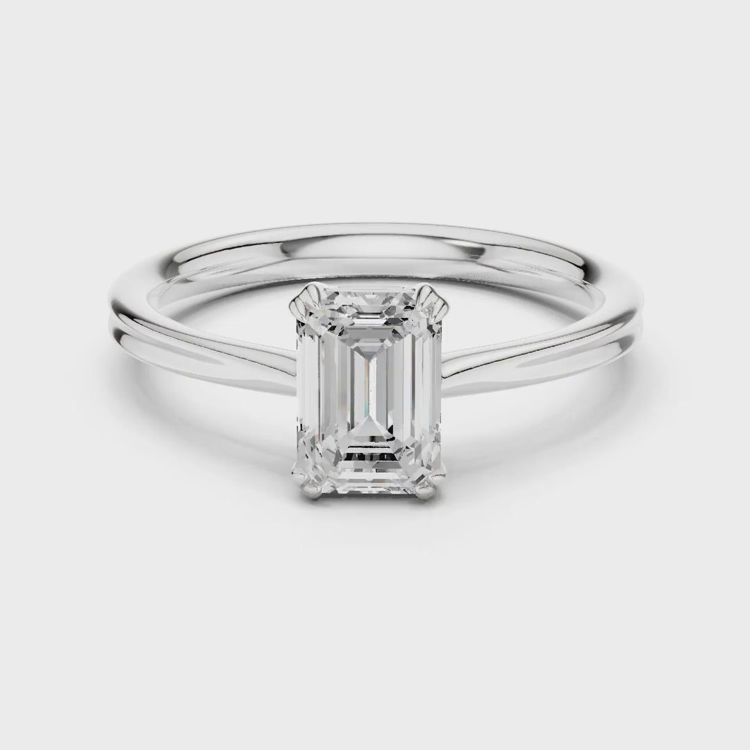 MJR0155 - Double Claw Emerald Solitaire Ring on Rounded Shank