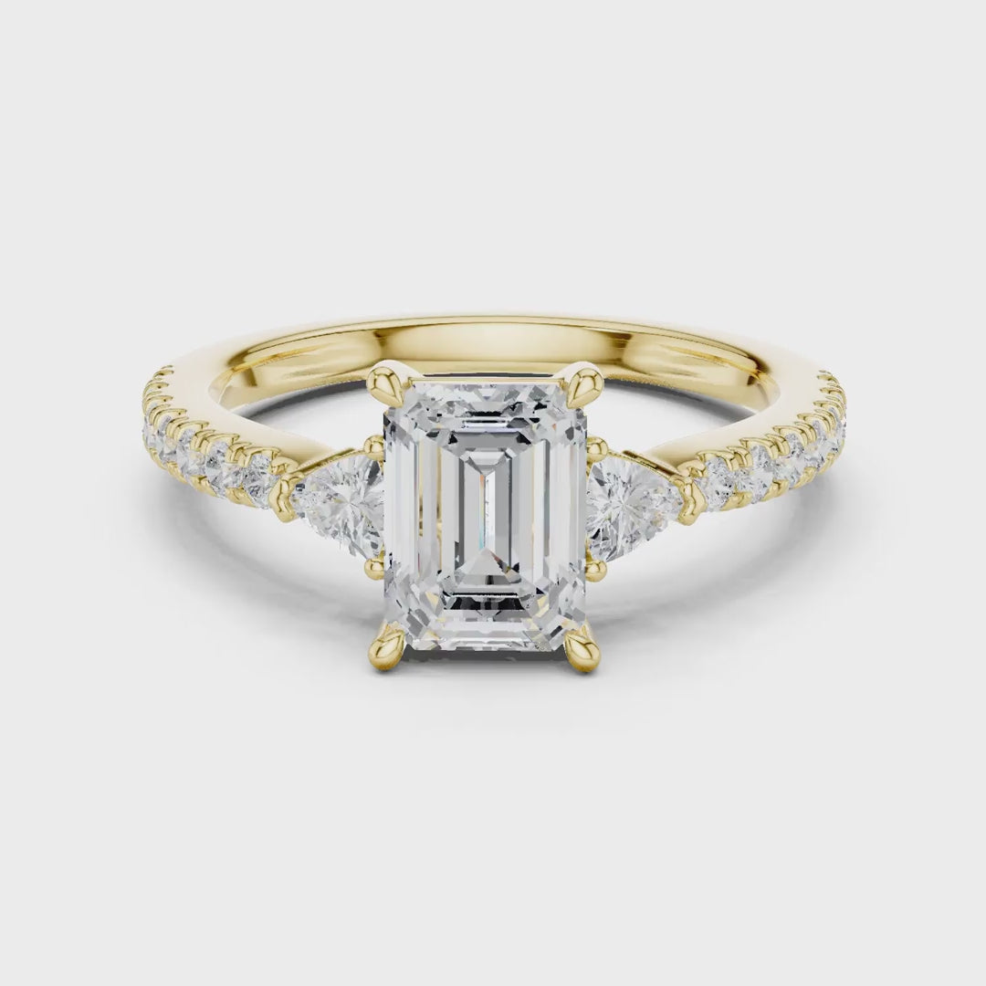 MJR0146- Elegant Emerald Cut Side-Flanked Brilliant Band