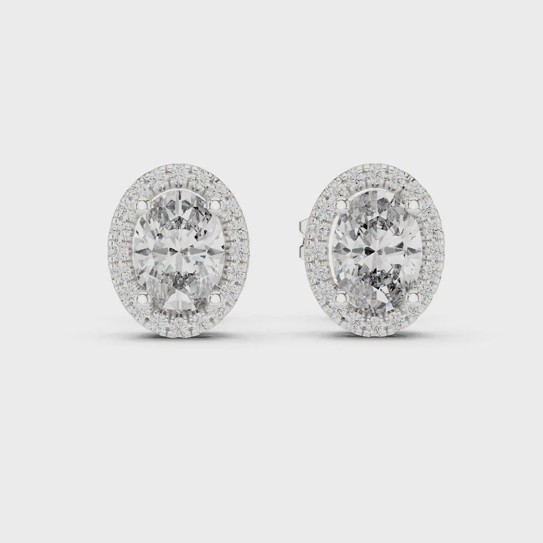 MJER51 - Classic Elongated Solitaire Halo Earrings