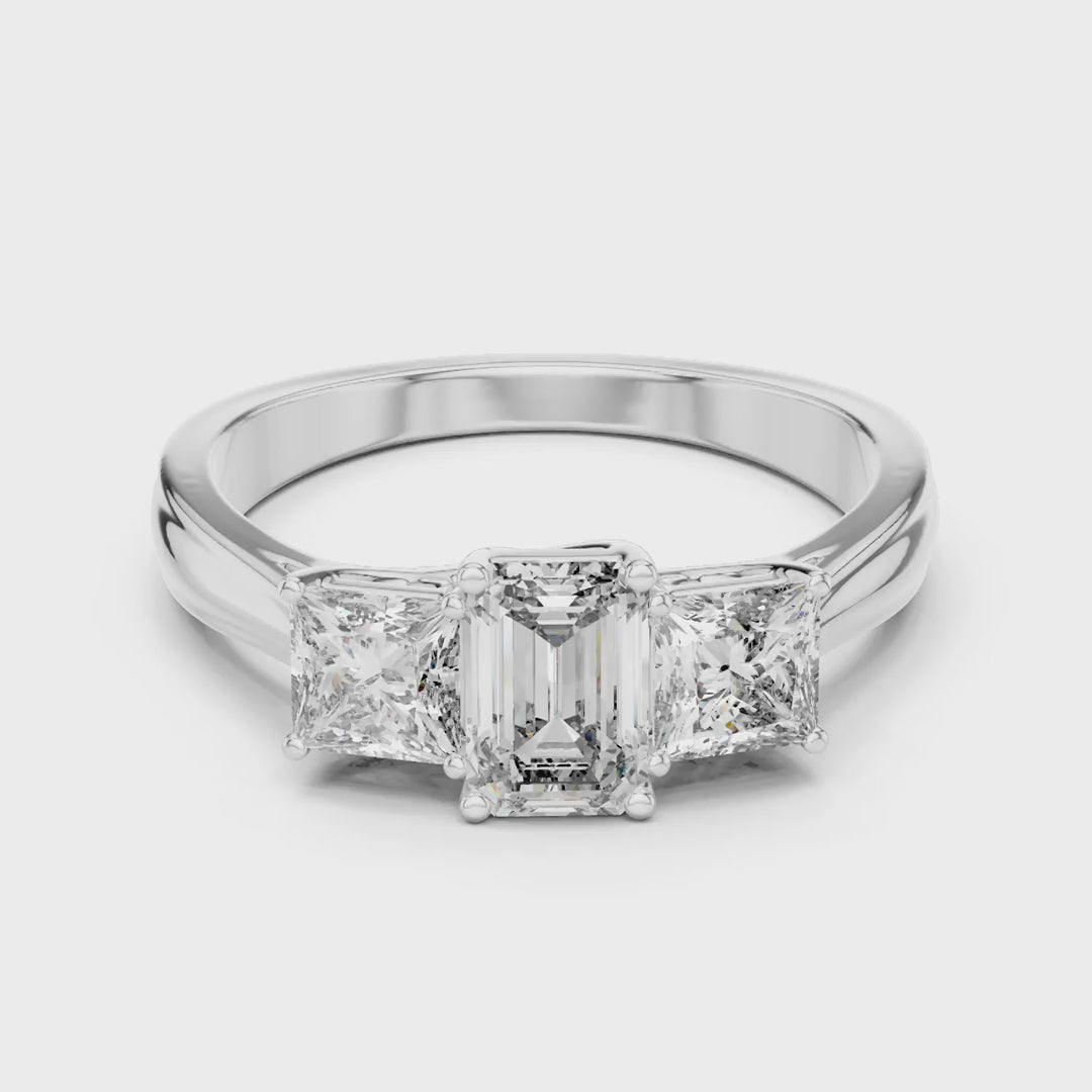 MJR007 - Emerald Cut Three Stone Engagement Ring