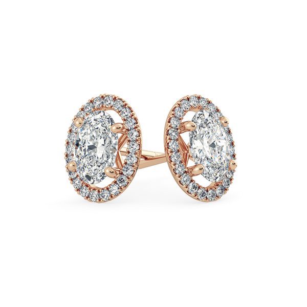 Oval diamond stud earrings with halo Dubai