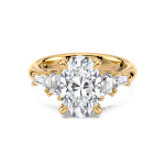 Oval diamond ring with side baguette diamonds